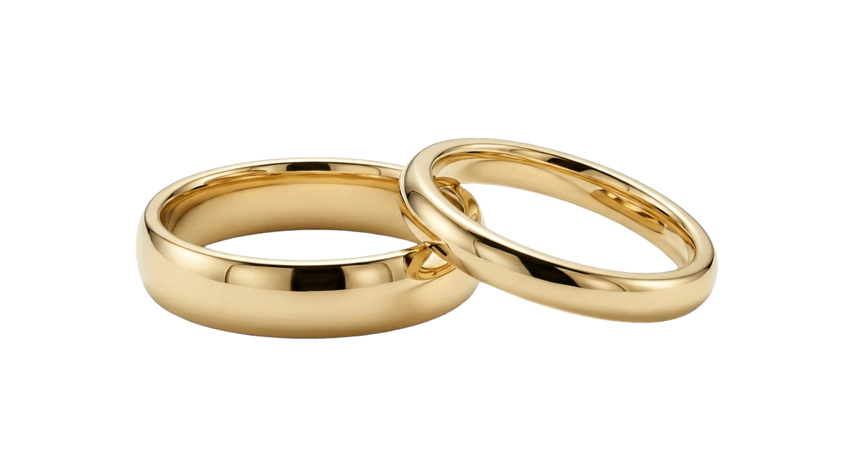 Gold wedding rings on white silk